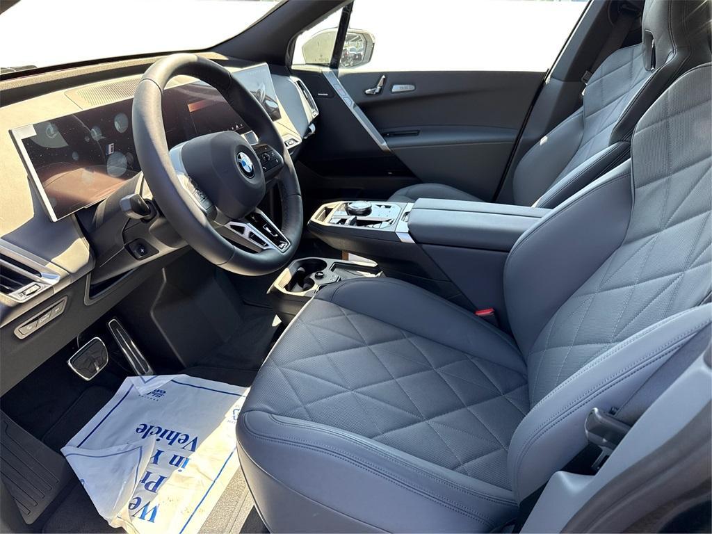 new 2026 BMW iX car, priced at $103,925