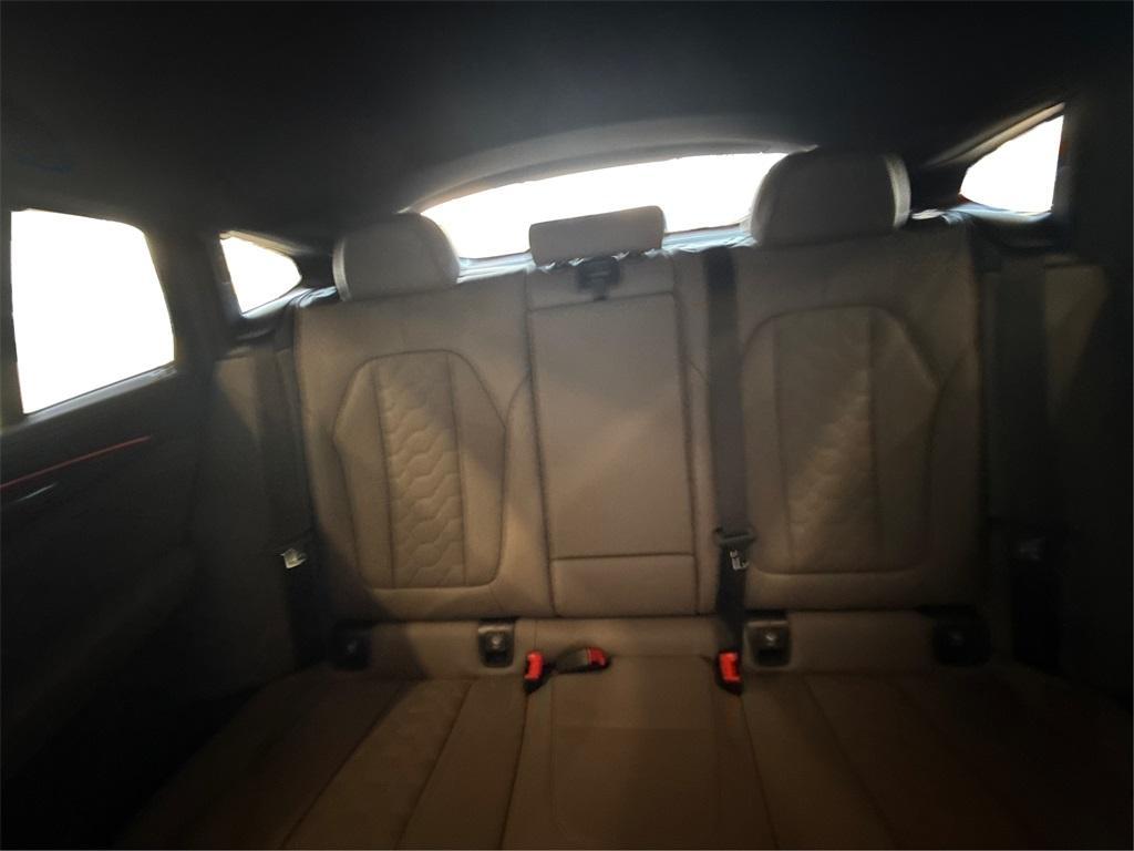 new 2025 BMW X4 M car, priced at $86,825