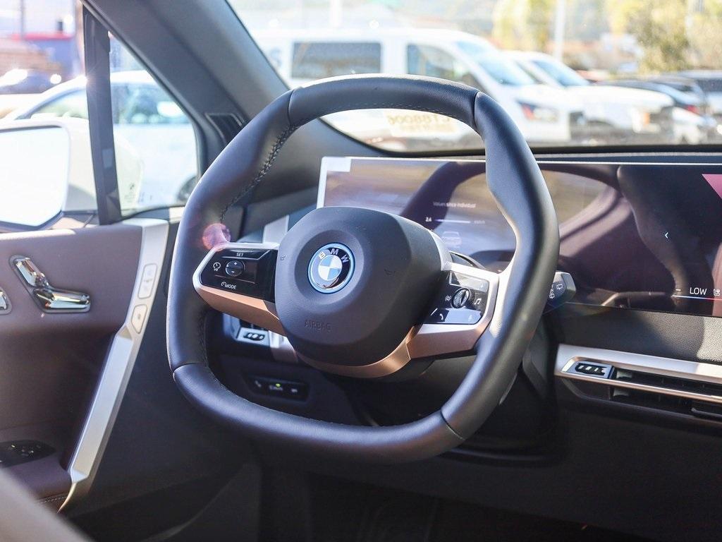 new 2025 BMW iX car, priced at $99,425