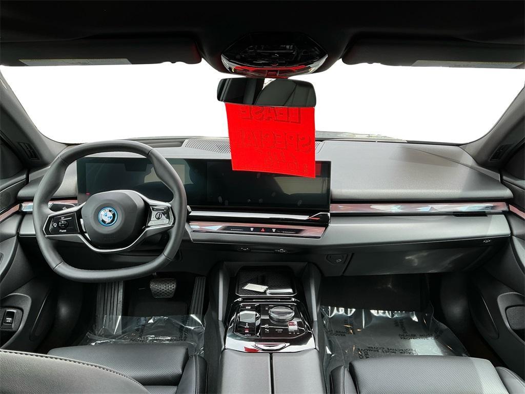 used 2024 BMW i5 car, priced at $59,995