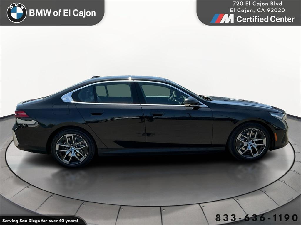 used 2024 BMW i5 car, priced at $59,995