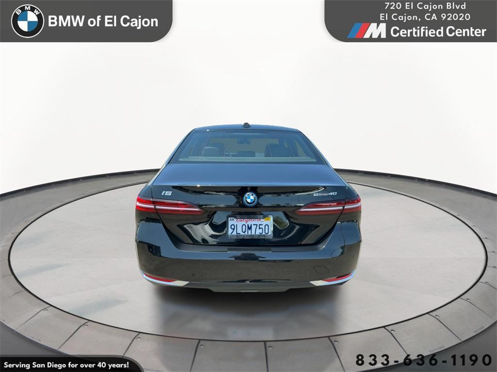 used 2024 BMW i5 car, priced at $59,995