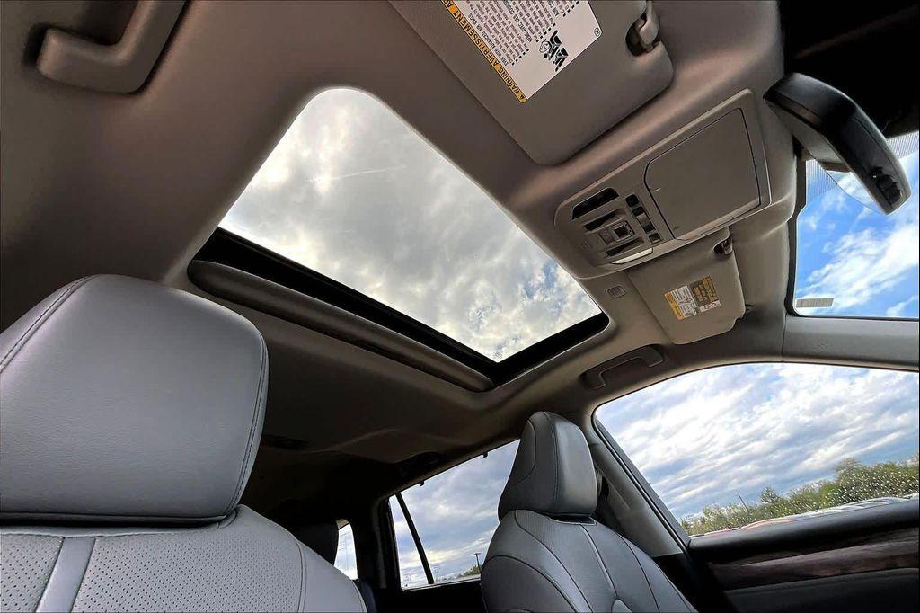 used 2021 Toyota Highlander Hybrid car, priced at $37,995