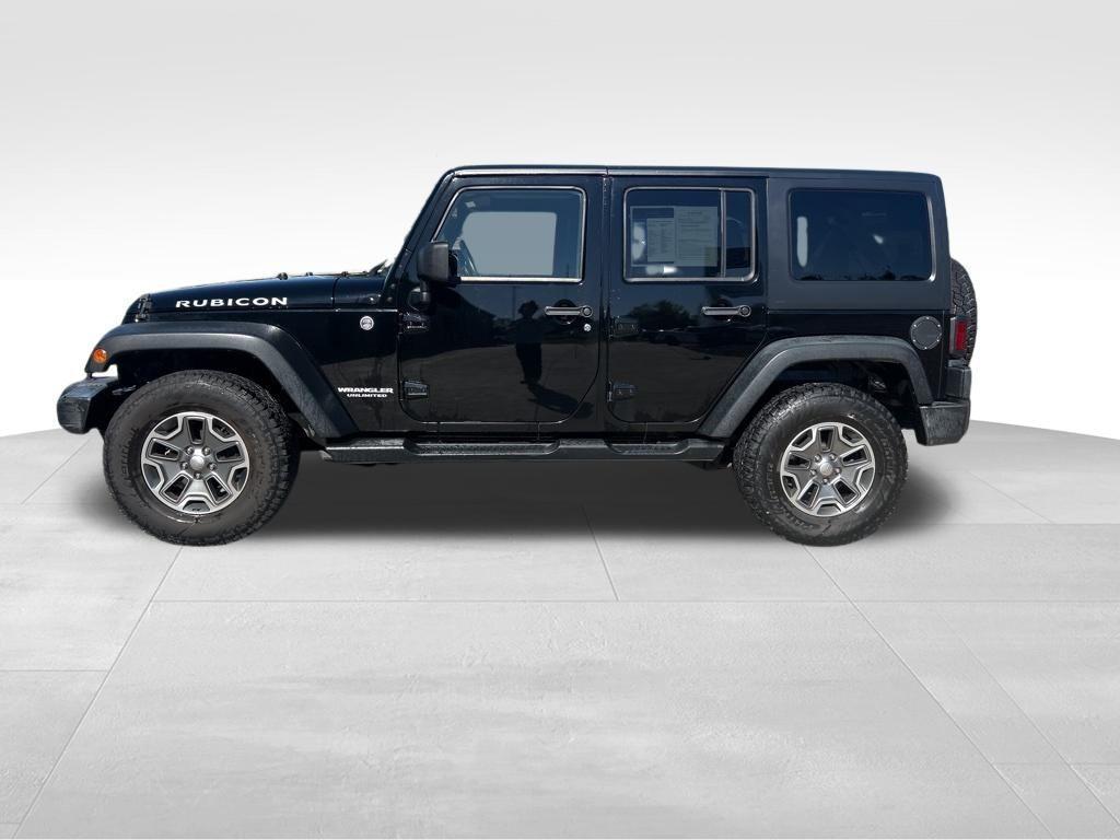 used 2013 Jeep Wrangler Unlimited car, priced at $22,572