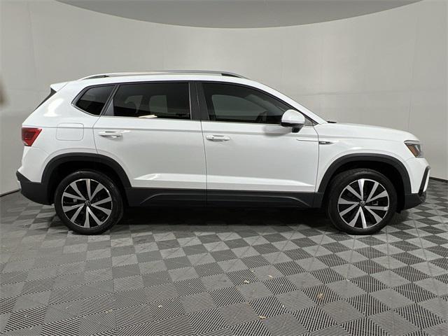 used 2023 Volkswagen Taos car, priced at $23,607