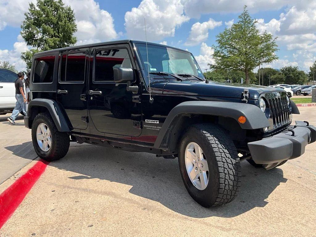used 2015 Jeep Wrangler Unlimited car, priced at $19,901