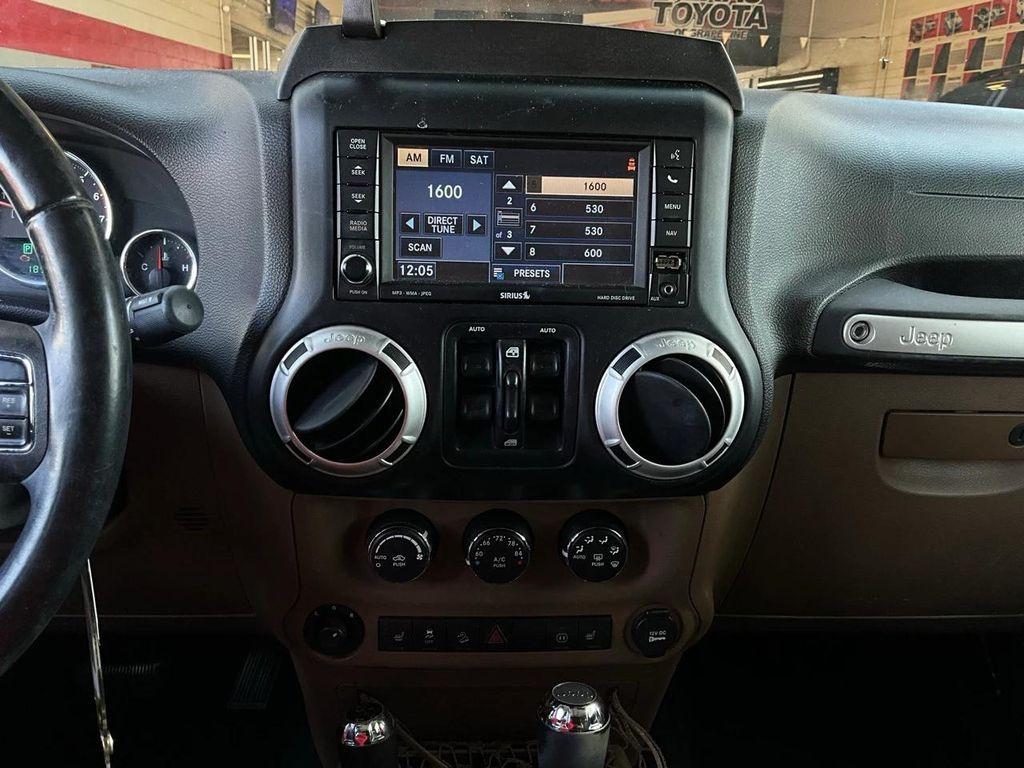 used 2011 Jeep Wrangler Unlimited car, priced at $10,701