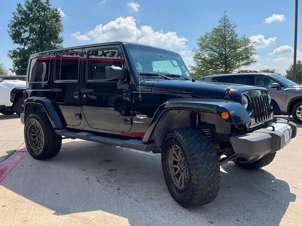 used 2011 Jeep Wrangler Unlimited car, priced at $10,701