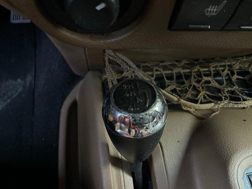 used 2011 Jeep Wrangler Unlimited car, priced at $10,701