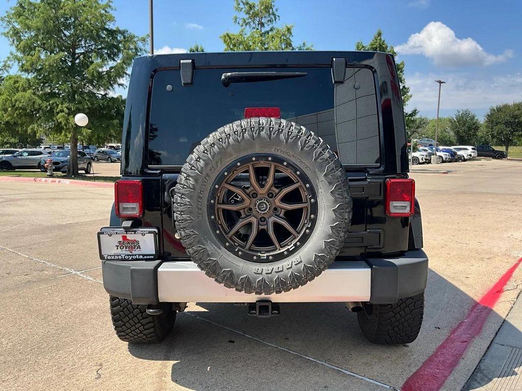 used 2011 Jeep Wrangler Unlimited car, priced at $10,701