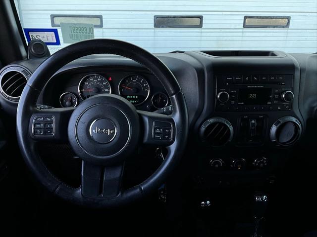 used 2013 Jeep Wrangler Unlimited car, priced at $19,901