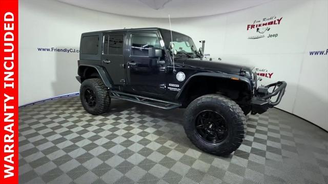 used 2015 Jeep Wrangler Unlimited car, priced at $17,457