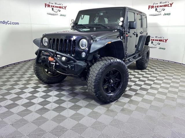 used 2015 Jeep Wrangler Unlimited car, priced at $18,175