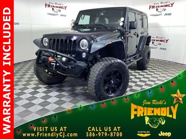 used 2015 Jeep Wrangler Unlimited car, priced at $17,457