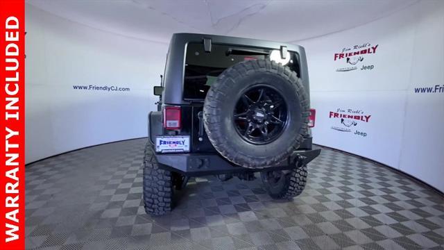 used 2015 Jeep Wrangler Unlimited car, priced at $17,457