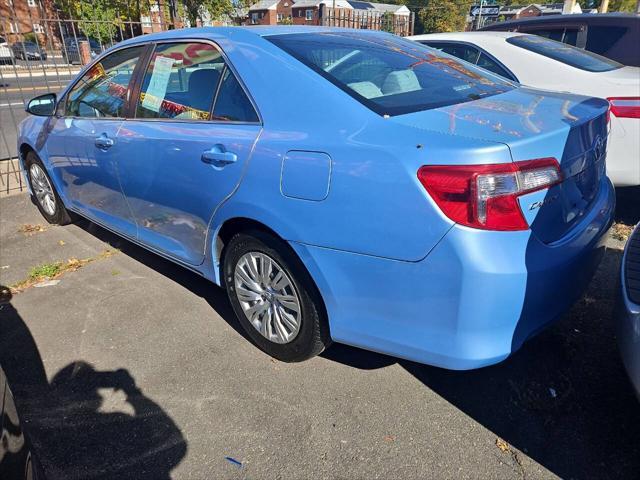 used 2014 Toyota Camry car, priced at $9,499