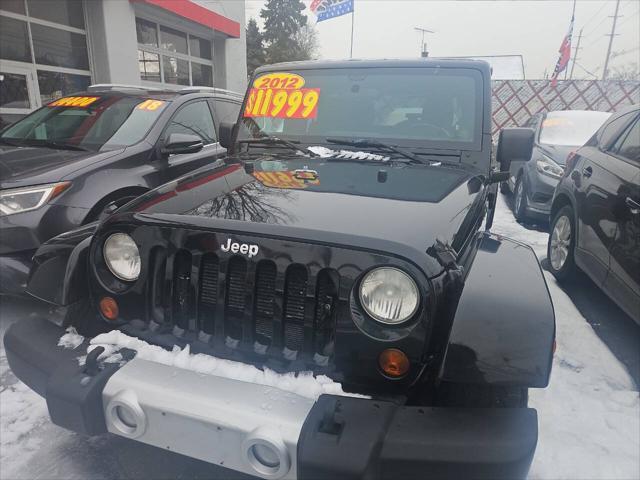 used 2012 Jeep Wrangler Unlimited car, priced at $11,999