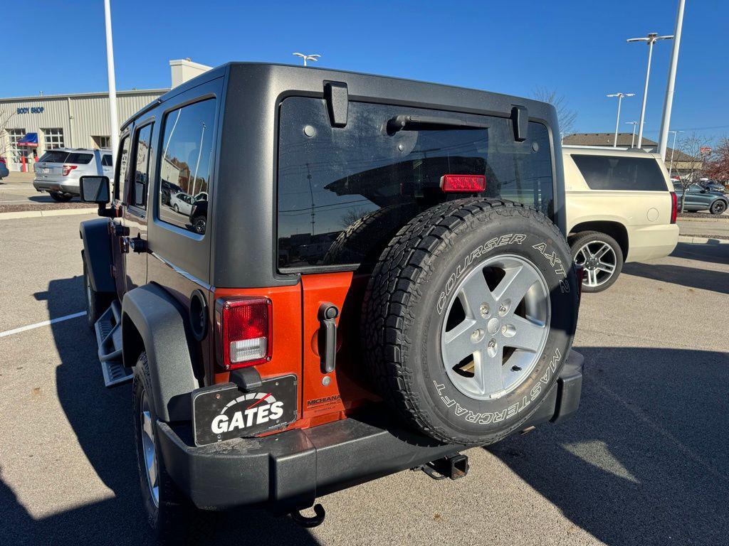used 2014 Jeep Wrangler Unlimited car, priced at $19,896