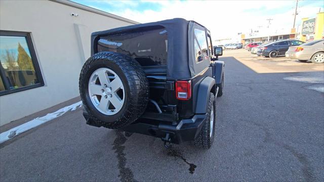 used 2015 Jeep Wrangler car, priced at $16,097