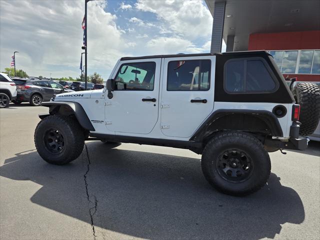 used 2011 Jeep Wrangler Unlimited car, priced at $14,998