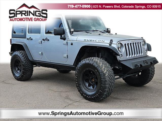 used 2014 Jeep Wrangler Unlimited car, priced at $25,998