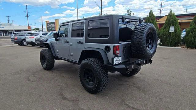 used 2014 Jeep Wrangler Unlimited car, priced at $25,998