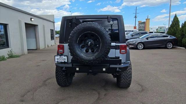 used 2014 Jeep Wrangler Unlimited car, priced at $25,998