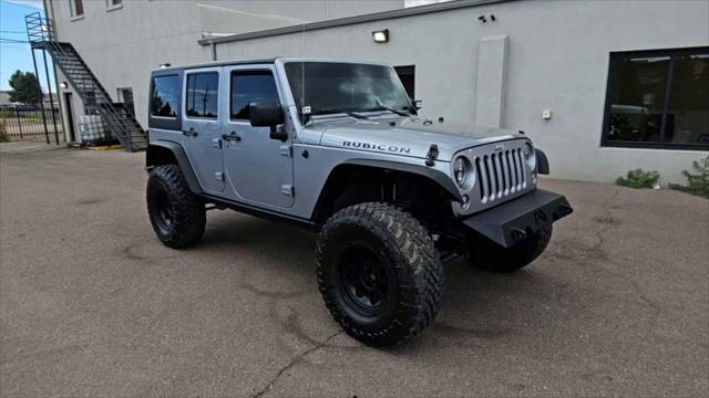 used 2014 Jeep Wrangler Unlimited car, priced at $25,998