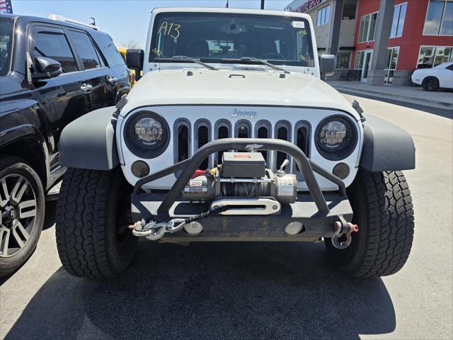 used 2015 Jeep Wrangler Unlimited car, priced at $23,994