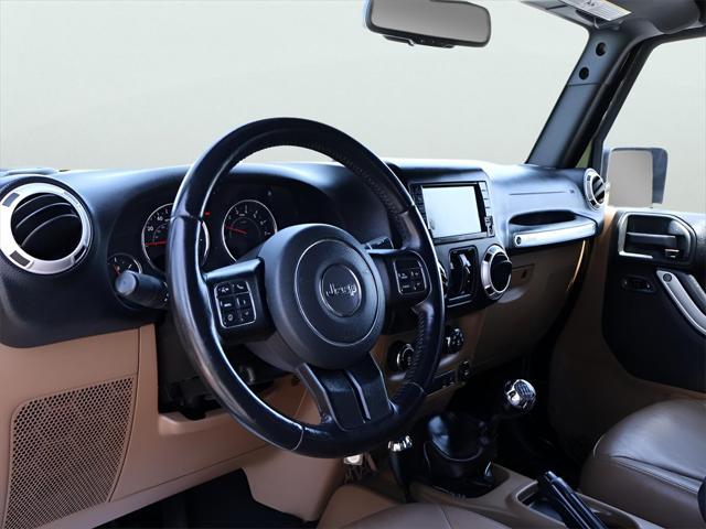 used 2015 Jeep Wrangler Unlimited car, priced at $23,900