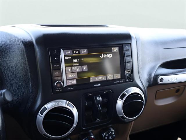 used 2015 Jeep Wrangler Unlimited car, priced at $23,900