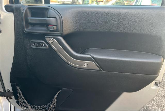 used 2012 Jeep Wrangler Unlimited car, priced at $13,950