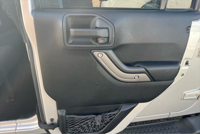 used 2012 Jeep Wrangler Unlimited car, priced at $13,950
