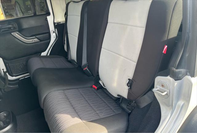 used 2012 Jeep Wrangler Unlimited car, priced at $13,950