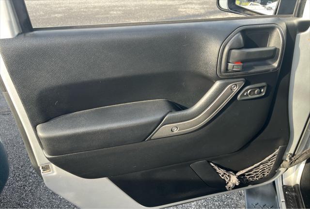 used 2012 Jeep Wrangler Unlimited car, priced at $13,950