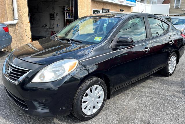 used 2012 Nissan Versa car, priced at $6,450