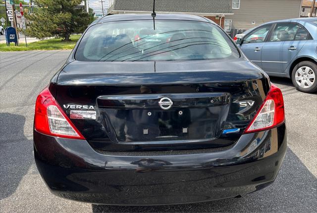 used 2012 Nissan Versa car, priced at $6,450