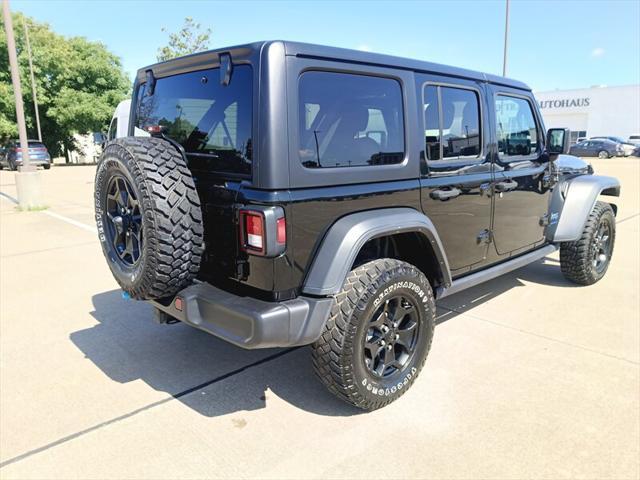 used 2023 Jeep Wrangler 4xe car, priced at $28,888