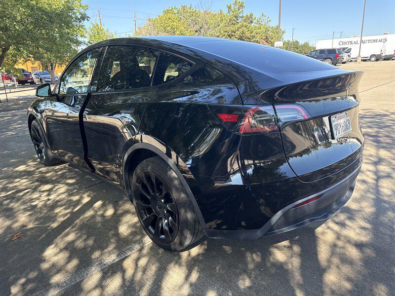 used 2023 Tesla Model Y car, priced at $27,888