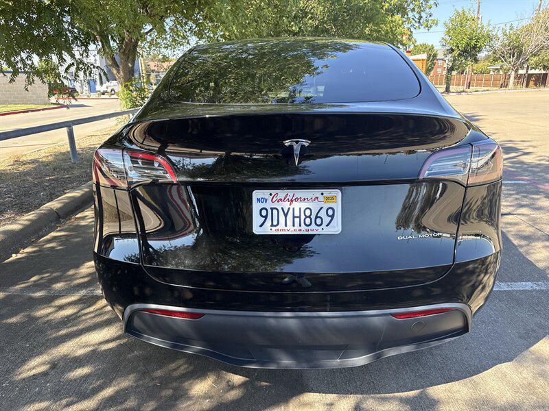 used 2023 Tesla Model Y car, priced at $27,888