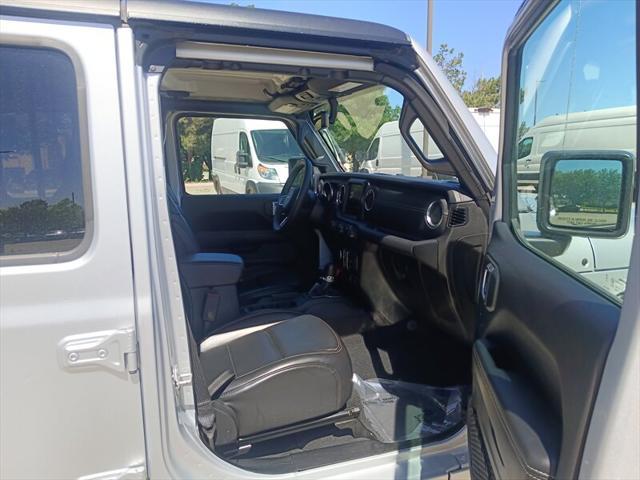 used 2023 Jeep Wrangler 4xe car, priced at $27,888
