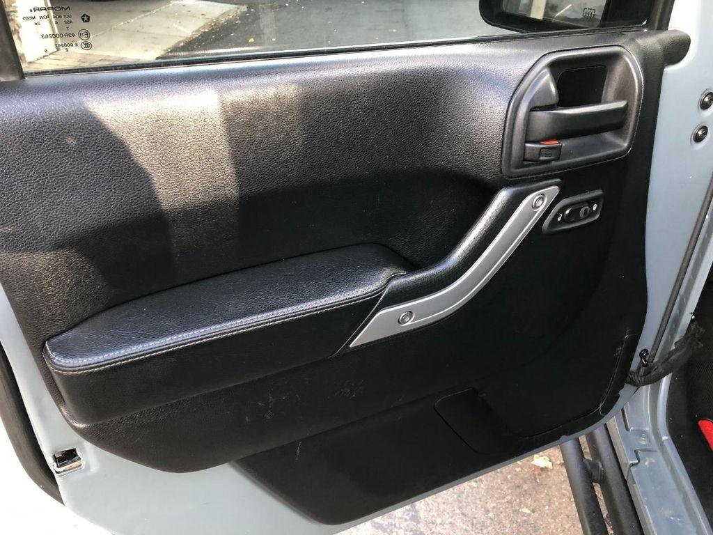 used 2015 Jeep Wrangler Unlimited car, priced at $17,990