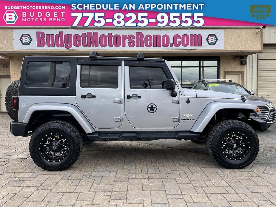 used 2014 Jeep Wrangler Unlimited car, priced at $21,990