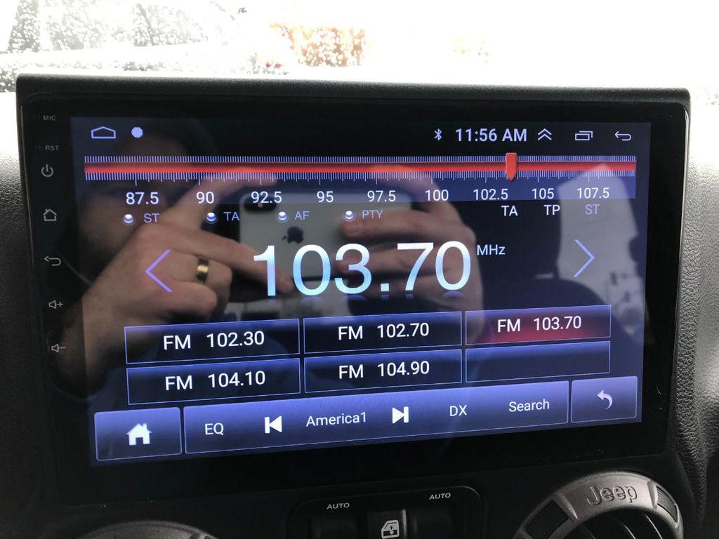 used 2015 Jeep Wrangler Unlimited car, priced at $16,954