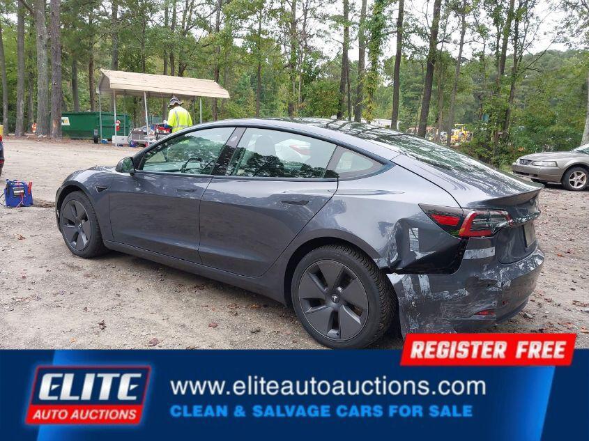 used 2022 Tesla Model 3 car, priced at $9,750