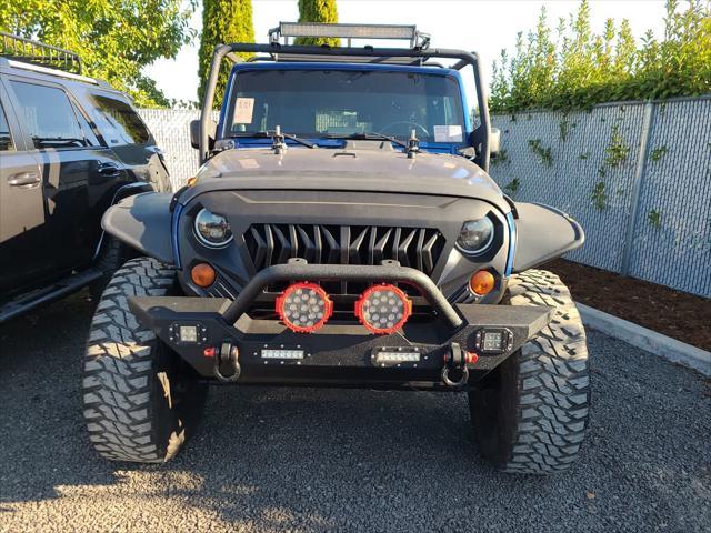 used 2009 Jeep Wrangler Unlimited car, priced at $16,998