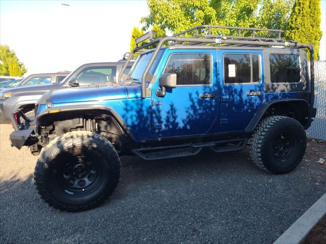 used 2009 Jeep Wrangler Unlimited car, priced at $16,998