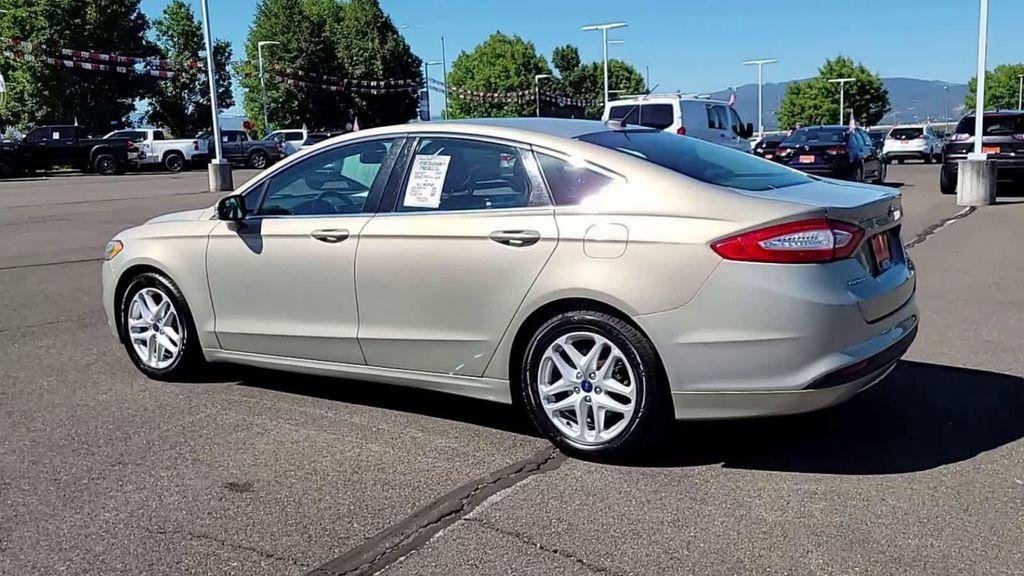 used 2015 Ford Fusion car, priced at $10,998