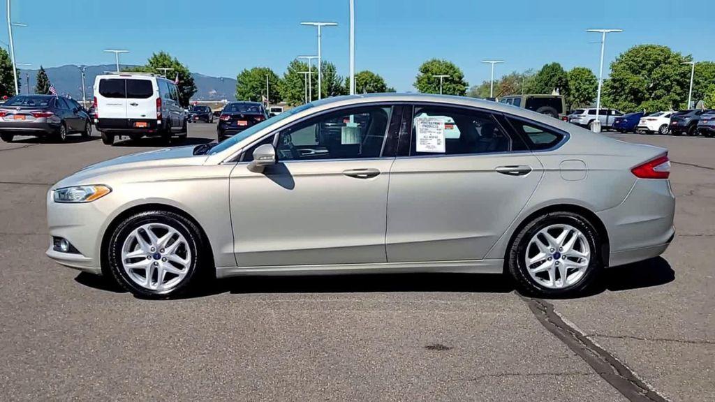 used 2015 Ford Fusion car, priced at $10,998