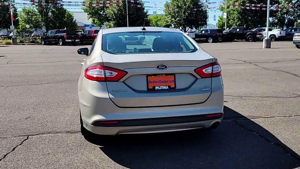 used 2015 Ford Fusion car, priced at $10,998